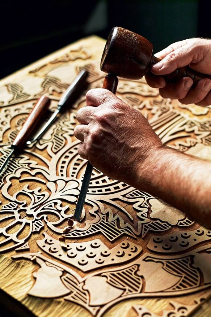 artisan making wooden handicrafts